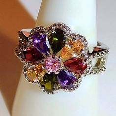 Size 9 - Sterling Silver Plated Colorful Gemstones Flower Ring New-Never Worn(Nwot) Free Shipping If You Would Like To See More Photos Please Ask! Elegant Multicolor Flower-shaped Rings, Multicolor Multi-stone Flower Jewelry, Multicolor Flower-shaped Multi-stone Jewelry, Multicolor Flower Ring As A Gift, Multicolor Flower Ring For Gift, Colorful Gemstones, Bohemian Rings, Ring Color, Flower Ring