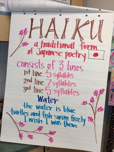 a sign with writing on it that says hauku, a traditional form of japanese poetry consists of 3 lines