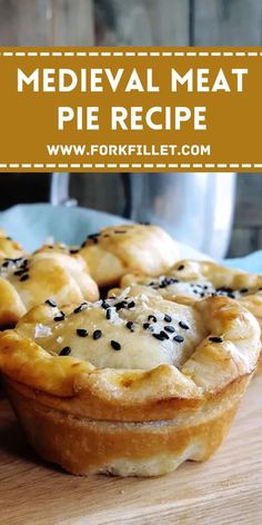 several small pies sitting on top of a wooden table with text overlay that reads medieval meat pie recipe