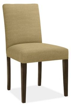 an upholstered side chair with dark wood legs and a beige fabric seat cover