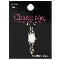 charm me necklace with an oval mirror on it