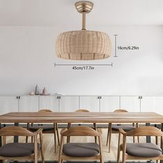 a dining room table with six chairs and a light fixture above it, measurements for the height