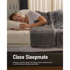 a woman is sleeping on her bed with the text close sleepmate written below it