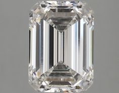 an emerald cut diamond is shown in this close up shot, with the center stone visible