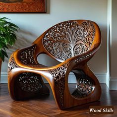 a wooden chair sitting on top of a hard wood floor next to a potted plant