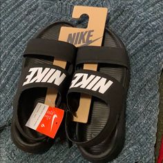 New Women’s Nike Tanjun Sandals Nike Sandals Women Outfits, Nike Tanjun Sandals, Nike Sandals Women, Nike Benassi Duo, Nike Flip Flops, Nike Sandals, Brown Flip Flops, Nike Benassi, Nike Slides