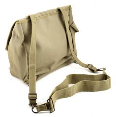 U.S. WW2 M1936 Musette Bag with Shoulder Strap-Lt OD Marked JT&L® 1943. Standard M1936 Musette Bag. Quality cotton webbing Available in: Khaki Marked JT&L® 1942 Lt OD Marked JT&L® 1943 Dark OD Marked JT&L® 1944 Check out all colors on our store! Shoulder strap included slinging across the chest, Perfect for your books, etc. Cannot be worn on the back without the M1936 suspenders- Sold separately. This sale is for 1 LT OD Musette bag only. Expertly Handcrafted Replica Vintage Canvas Satchel With Pockets, Vintage Outdoor Shoulder Bag With Pockets, Vintage Shoulder Bag With Pockets For Outdoor, Vintage Flap School Bag, Vintage Khaki Shoulder Bag For Everyday, Vintage Beige Bags With Pockets, Everyday Vintage Khaki Shoulder Bag, Vintage Khaki Bags For Daily Use, Vintage Khaki Bag With Adjustable Strap