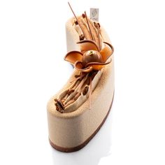 an image of a shoe that is made out of wood