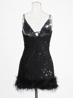 Be the life of the party in this sequin and feather-trimmed mini dress, featuring convertible straps and a fun, flirty silhouette. Everyone will be clucking over your fabulous look! Elasticity: Slight Stretch Decoration: Feathers Material: Polyester Glamorous Black Sequined Flapper Dress, Black Sequin Dress With Spaghetti Straps For Party Season, Glamorous Flapper Dress For Holiday Night Out, Glamorous Holiday Flapper Dress For Night Out, Black Sequin Dress With Spaghetti Straps For Cocktail, Black Sequin Cocktail Dress With Spaghetti Straps, Chic Sequin Dress With Feather Trim For Party, Glamorous Feather Trim Flapper Dress For Party Season, Black Glamorous Flapper Dress For Party Season