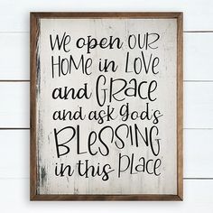 a wooden sign that says we open our home in love and grace and ask god's blessing in this place