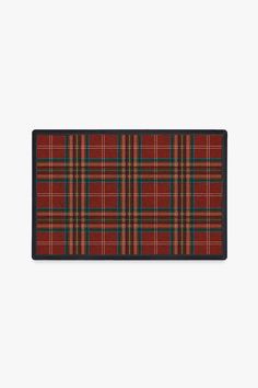 a red and black plaid rug on a white background