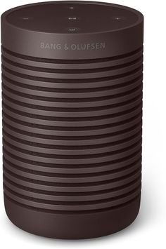 the bang & olufsen bluetooth speaker is brown and has black stripes on it