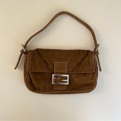 This Fendi Corduroy Baguette Bag Is A Staple Piece That Has Stolen The Hearts Of Many Since The Early 2000’s. This Stunning Corduroy Piece Will For Sure Be A Bag In Your Collection That You Reach For Constantly! Pair With A Baby Tee For That True Y2k Vibe. In Good Condition. Measurements: Width: 10.5 In Depth: 1.5 In Length: 5.5 In Strap Drop: 6.75 In Lease Note: Hairline Scratches At Hardware And Minor Wear In Shoulder Straps As Shown In Photos. Fendi Baguette Bag, Early 2000’s, Vintage Fendi, Y2k Vibes, Fendi Baguette, Baguette Bag, In Depth, Staple Pieces, Baby Tee