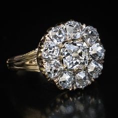 Circa 1880  This classic Victorian era 14K gold cluster ring features chunky and very clean old cushion cut diamonds.  Weight of the principal diamond is 1.04 carats (I color, VS1 clarity).  The center stone is surrounded by nine sparkling diamonds (I-J color, VS1 - VS2 clarity).  Estimated total diamond weight is 3.50 carats.  Diameter of the diamond cluster is 15 mm (9/16 in.)  Ring size 9.75 (20 mm) resizable Antique Cushion Cut Diamond, Emerald Ring Engagement Diamond, Diamond Sapphire Engagement Ring, Sapphire Diamond Engagement, Old Mine Cut Diamond, Platinum Diamond Engagement Rings, Emerald Diamond Ring, Faberge Eggs, Engagement Ring Diamond Cut