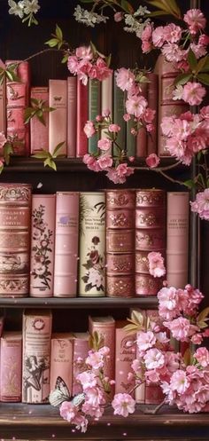 pink flowers and books on shelves in a room