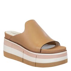 PRICES MAY VARY. layered EVA 2.75" platform and outsole with flex grooves luxury athleisure and boho style round open toe handcrafted with genuine leather, fabric lining fits true to size inked leather edges Luxury Athleisure, Soft Leather Sandals, Women Platform Sandals, Modern Wardrobe, Slide In, Platform Wedge, Shoes With Jeans, Brown Sandals, Metallic Leather