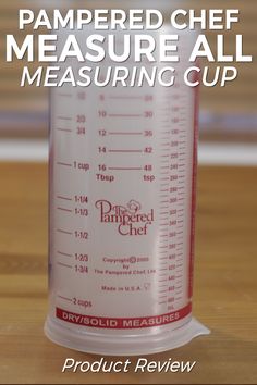 a measuring cup with the words pampered chef measure all measuring cup