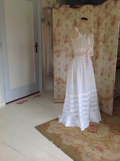 "amazing silk cotton camisole, in excellent condition. this camisole will be a beautiful summer top or wedding top.. the ribbons are pure silk with a woven pattern. the lace is Chantilly lace measurements: bust 86 cm 34\" waist 76 cm 30\" length 40 1/2 cm 16\" this top will be shipped with insurance" Sleeveless Lace Bodice Summer Corset, Summer Lace Corset With Lace Trim, White Sleeveless Lace Bodice, Lace Underbust Camisole With Lace Trim, Summer Lace Corset With Feminine Style, Summer Corset With Lace And Fitted Bodice, Summer Corset With Lace Bodice, Summer Lace Bodice Fitted Corset, Fitted Lace Bodice Corset For Summer