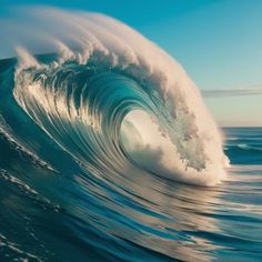 a large wave is breaking in the ocean