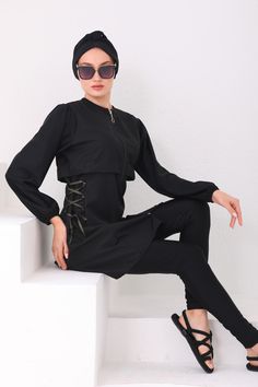 This black swimsuit set, combining comfort and style, is poised to become a staple of summer days with its water-resistant feature and quick-drying capability. Offering freedom of movement with its Lycra structure, while the design details accentuate your style. The post Black Lace-Up Burkini appeared first on Burkini Remsa. Muslim Swimwear, Full Coverage Swimsuit, Modest Swimwear, Boys Swimwear, Swimsuit Set, Kids Swimwear, Freedom Of Movement, Black Swimsuit, Swim Suit