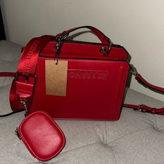 Steve Madden Bevelynn Chevy Red Satchel Structured Top Handle Bag 2 Gusseted Compartments Top Zipper Compartment With Interior Zipper Pocket Top Flap Compartment With Snap Closure Custom Branded Hardware At Front Oversized O-Ring Top Handle Hardware Detachable Zipper Pouch Detachable Adjustable Branded Webbing Crossbody Strap 7.25in H X 9.25in W X 4.5in D Just A Reminder, Poshmark Takes 20%, So Please Consider That When Sending Offers. *Only Reasonable Offers Will Be Considered* Red Bags With Silver-tone Hardware, Handle Hardware, Red Satchel, Structured Top, Steve Madden Handbags, Floral Purse, Steve Madden Bags, Just A Reminder, Leather Mary Janes