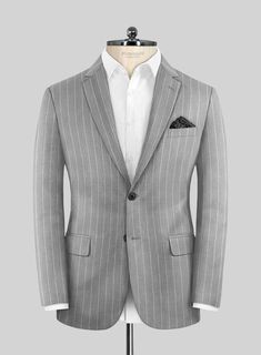 Dive into the realm of understated sophistication with our Napoleon Como Bar Gray Wool Suit. This ensemble is meticulously crafted from a luxurious wool blend, offering a smooth, breathable fabric that's delightfully soft to the touch and ensures comfort without feeling restrictive. Featuring a subtle striped pattern across a palette of gray shades, this suit is a testament to refined style. It’s exquisitely tailored to not only fit comfortably but also to enhance your silhouette, providing enough space for movement while maintaining warmth. Perfect for any scheduled event or special occasion, this suit allows you to express your sartorial elegance effortlessly.  Look Includes    Napolean     Como     Bar     Gray     Wool  Fabric  Two Button Jacket Style  Notch Lapel  Horn Royal Black But Classic Fitted Blazer In Suiting Fabric, Timeless Fitted Suit With Flat Front, Timeless Fitted Flat Front Suit, Bespoke Fitted Wool Blazer, Grey Wool Suit, Gray Shades, Striped Suit, Refined Style, Button Jacket