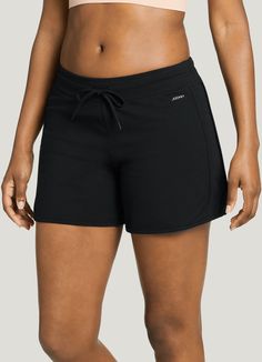 From working out to chilling out to lights out, the Jockey® Cotton Jersey Sport Short, makes any time of day feel more comfortable. This soft, stretchy short features an easy-fitting elasticized drawstring waistband. Relaxed styling for comfort and extends to mid-thigh for ease of movement. | Jockey® Cotton Jersey 5" Sport Shorts in Black Casual Training Shorts With 5-inch Inseam, Sporty Solid Color Pajama Shorts With Relaxed Fit, Sporty Solid Color Relaxed Fit Pajama Shorts, Casual Athletic Shorts With 4-way Stretch And Light Support, Casual 5-inch Inseam Athletic Shorts For Training, Comfortable Black Pajama Shorts, Casual Athletic Shorts With Light Support For Workout, Casual Athletic Shorts With Light Support, Casual Workout Shorts With Light Support