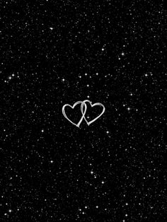 two hearts in the sky with stars