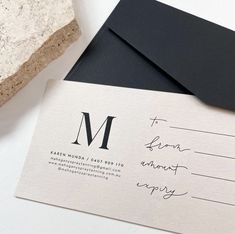 a close up of a piece of paper with a letter on it and a envelope