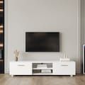 a white entertainment center with a flat screen tv on it's stand in a living room