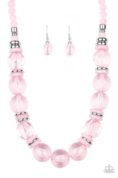 Featuring dainty silver and pink acrylic discs, a collection of oversized glassy pink beads are threaded along an invisible wire below the collar for a colorfully bubbly look. Features an adjustable clasp closure. Handmade Adjustable Pink Necklace, Pink Faceted Round Bead Necklaces, Luxury Pink Necklace With Faceted Beads, Adjustable Pink Faceted Beaded Necklace, Adjustable Pink Necklace With Large Beads, Bedazzled Jewelry, Pink Jewels, Orange Necklace, Bling Necklace