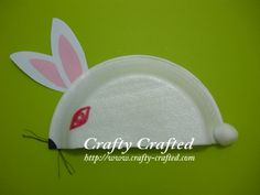 a paper plate with a bunny's head on it and the words crafty crafted above it