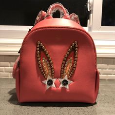 Brand New - Coral Blush Leather Polke Star Bunny Studded Backpack From Mcm. Authentic Purchased From Hautelook, Never Used!! Designer Red Backpack, Designer Pink Backpack, Designer Pink Leather Backpack, Designer Pink Standard Backpack, Luxury Pink Standard Backpack, Luxury Pink Backpack, Mcm Backpack, Studded Backpack, Coral Blush