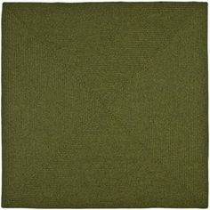 a green rug on a white background