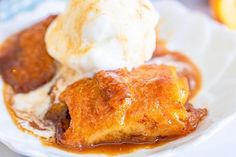 a white plate topped with dessert and ice cream