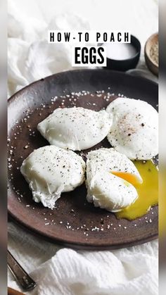 three eggs on a plate with oil and salt