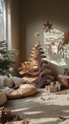 a christmas tree made out of wood sitting on top of a rug in front of a window