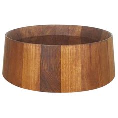 a wooden bowl is shown on a white background