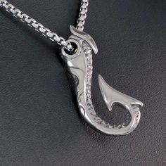 Uniquely Made Of Stainless Steel Maui Fish Hook Necklace Pendant H 40 Mm W 20 Mm Chain Also Stainless 22" W/Lobster Claw Clasp New & Nicely Boxed In Hawaiian Jewelry, The Pendant Symbolizes Energy, Prosperity, And Strength. Tradition Also Says That The Maui Hook Necklace Brings Its Wearer Good Luck And The Safe Passage Over Water. The Hei Matau Is Also Known As The Maori Fish Hook Necklace And Is Said To Bring The Wearer The Same Qualities As The Makau. Why Do People Wear Stainless Steel Jewelry Maui Fish Hook, Maui Hook, Maori Fish Hook, Free People Necklace, Clear Necklace, Fish Hook Necklace, Cameo Pendant Necklace, Hook Necklace, Flower Statement Necklace