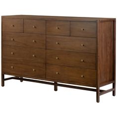 a large wooden dresser with many drawers