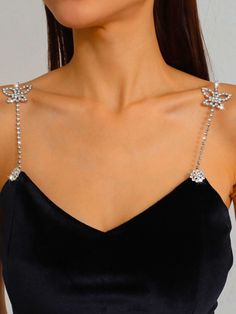 The Butterfly Bra Strap is adorned in crystal embellishments with a butterfly detail at the center. This embellished bra strap is the best way to elevate an outfit, make it more functional, and supportive while keeping the look classic and fashion forward. Style: Body Chain Chain Length: 23.62" Embellished Bra, Butterfly Bra, Chain Bra, Bra Strap, Bra Straps, Crystal Embellishment, Strapless Bra, The Butterfly, A Butterfly