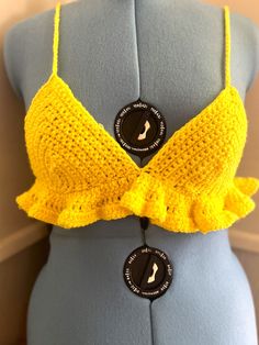 Cute ruffle top! prefect for summer!🌅 Unlimited colors & a various of sizes! Please include cup size (AA, A, B, C etc ) MATERIAL product is made of acrylic yarn. I am willing to use other type of yarn materials if requested. ORDER DETAILS Usually it will take me 5-7 days for creating a crochet top. Timing may vary depending on size and quantity. If you have any questions please be sure contact me  Thank you !❤ Bohemian Ruffled Crop Top For Beach, Spring Beach Crochet Top With Ruffles, Yellow Ruffled Top For Beach, Ruffled Crochet Top For Spring Vacation, Fitted Crochet Top With Ruffles For Spring, Bohemian Crochet Top With Ruffles For Beach, Spring Vacation Crochet Top With Ruffles, Spring Crochet Top With Ruffles For Vacation, Casual Summer Crochet Top With Ruffles