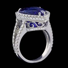 For Sale on 1stdibs - Platinum Cocktail Ring Features a Stunning Natural Vivid Blue 12.67 Carat Pear Shape Tanzanite set in a Halo of Round Brilliant Cut Diamonds. Additional Split Shank Ring, Tanzanite Ring, Blue Tanzanite, Halo Setting, Set Ring, Split Shank, Pretty Rings, Cz Diamond, Bridal Ring