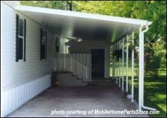 a house with white siding and black shutters