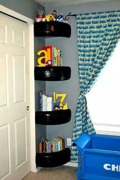 an image of a book shelf in the corner of a room with books on it