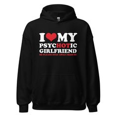 Celebrate the fiery spirit of your love with our "I Love My Psychotic Girlfriend" Hoodie, where the word 'Hot' in 'Psychotic' is boldly highlighted to add a playful twist. This cozy black hoodie features bold, eye-catching text that's sure to turn heads and spark conversations. It's the perfect choice for men who have a sense of humor and cherish their girlfriend's intense, passionate nature. Crafted from a premium, soft fabric blend, this hoodie provides ultimate comfort whether you're on a cas Funny Black Sweatshirt With Slogan, Funny Black Slogan Sweatshirt, Black Funny Slogan Sweatshirt, Funny Black Winter Sweatshirt, Girlfriend Hoodie, Hoodie Boyfriend, Anniversary Boyfriend, Couples Anniversary, Couple T-shirt