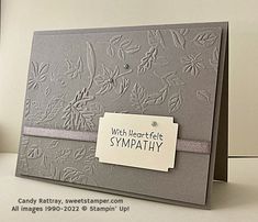 a close up of a greeting card with a tag on the front and back of it