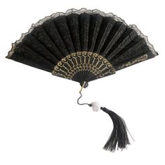 an old black fan with tassels hanging from it's side on a white background