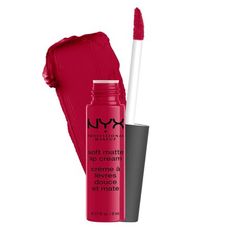 Treat your lips to a velvety smooth burst of creamy color! NYX Professional Makeup Soft Matte Lip Cream straddles the line between lipstick and gloss. This unique liquid to matte lipstick formula is neither lipstick nor lip gloss, but rather a whole new kind of lip color. The matte lip cream goes on silky smooth, then sets to a pigmented matte finish. Surprisingly durable, lightweight and delightfully creamy, its no wonder this sweetly scented formula is a fan favorite. The lip cream is light on Matte Red Lips, Red Lipstick Shades, Nyx Soft Matte Lip Cream, Long Lasting Matte Lipstick, Nyx Matte, Nyx Soft Matte, Makeup Soft, Soft Matte Lip Cream, Lip Smackers