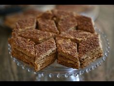 several pieces of cake on a glass plate